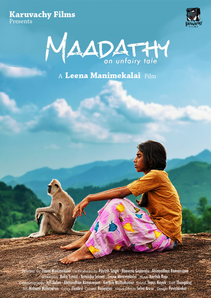 Movie poster for Maadathy that shows woman sitting with an animal